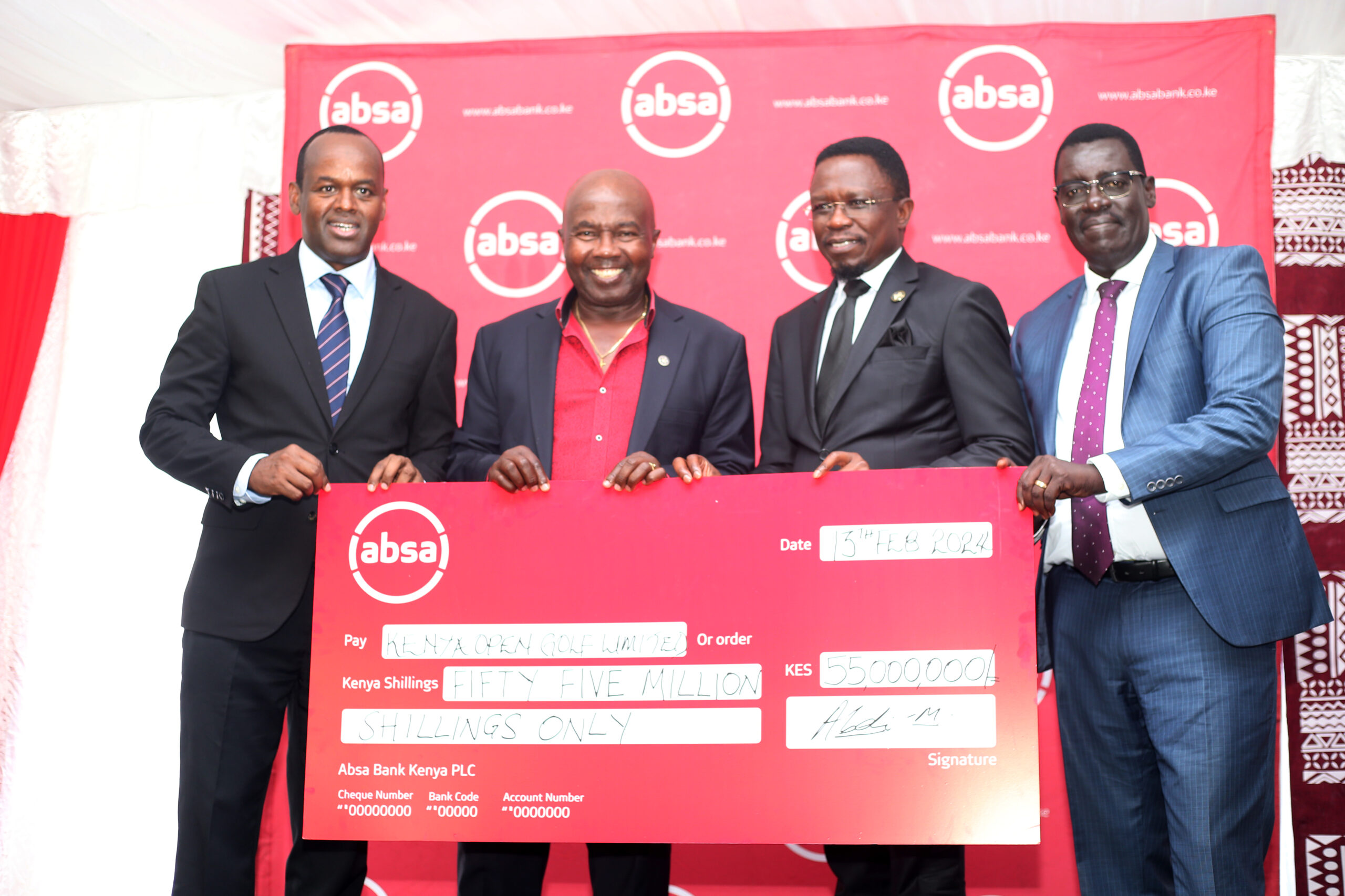 AbsaMDAbdiMohamedhandoverachequetoKenyaOpenPatrickObathand